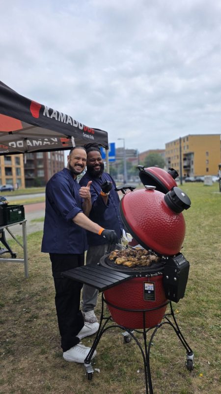 Two chefs next to the grill