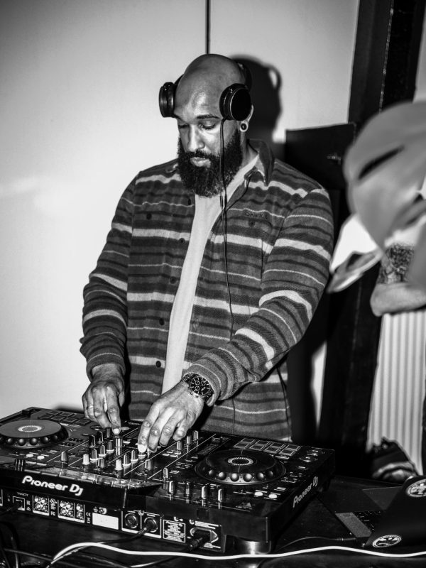 The DJ behind the decks