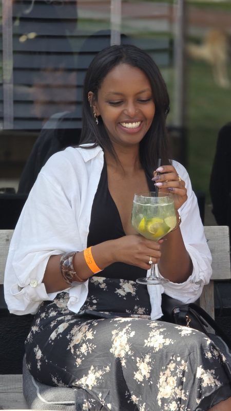 A guest with a cocktail